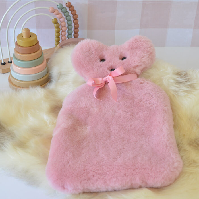 Tambo Teddies hot water bottle cover in dusty pink woollen sheepskin