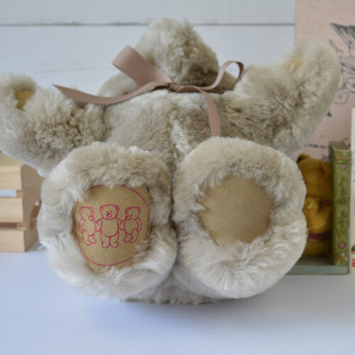 Tambo Teddy Basil logo bear