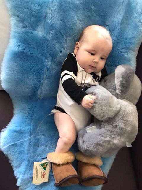 Baby Austin with his Tambo Teddy and sheepie