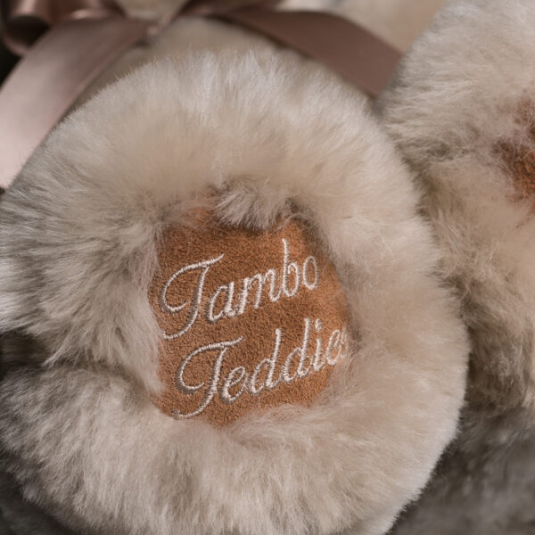 Embroidered paws on Tambo Teddies