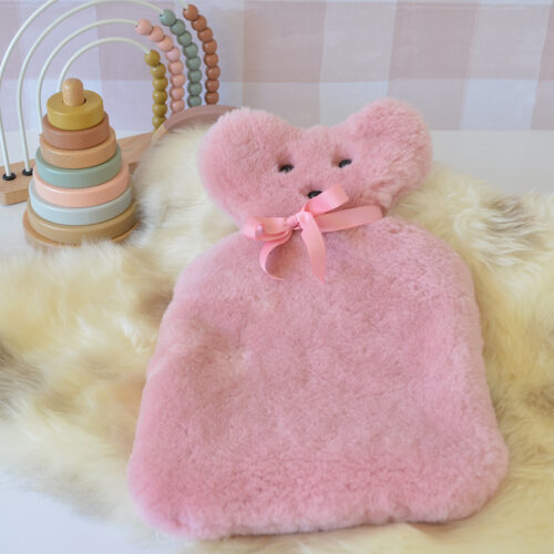 Tambo Teddies hot water bottle cover in dusty pink woollen sheepskin