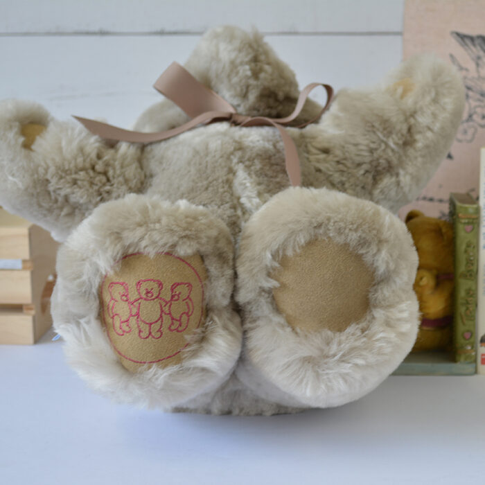 Tambo Teddy Basil logo bear